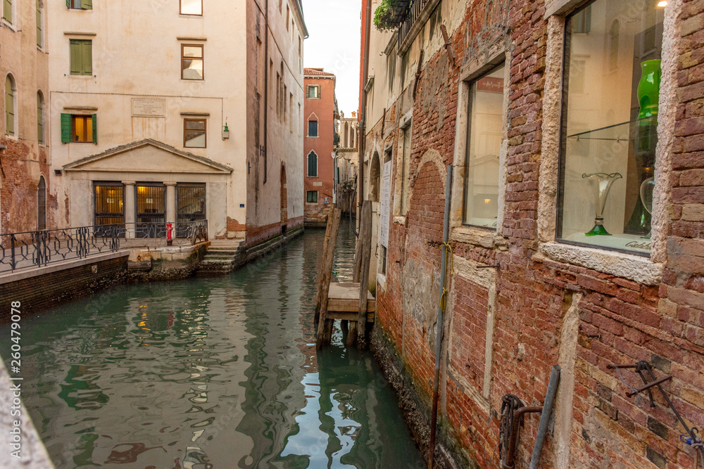 Italy, Venice, view of a canal between the buildings.