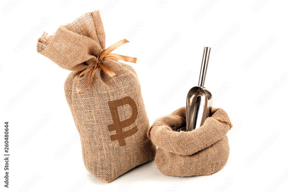 bags of Russian currency and a scoop in a bag on a white background isolated