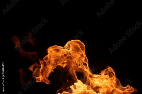 burning flame on dark background for abstract graphic design purpose