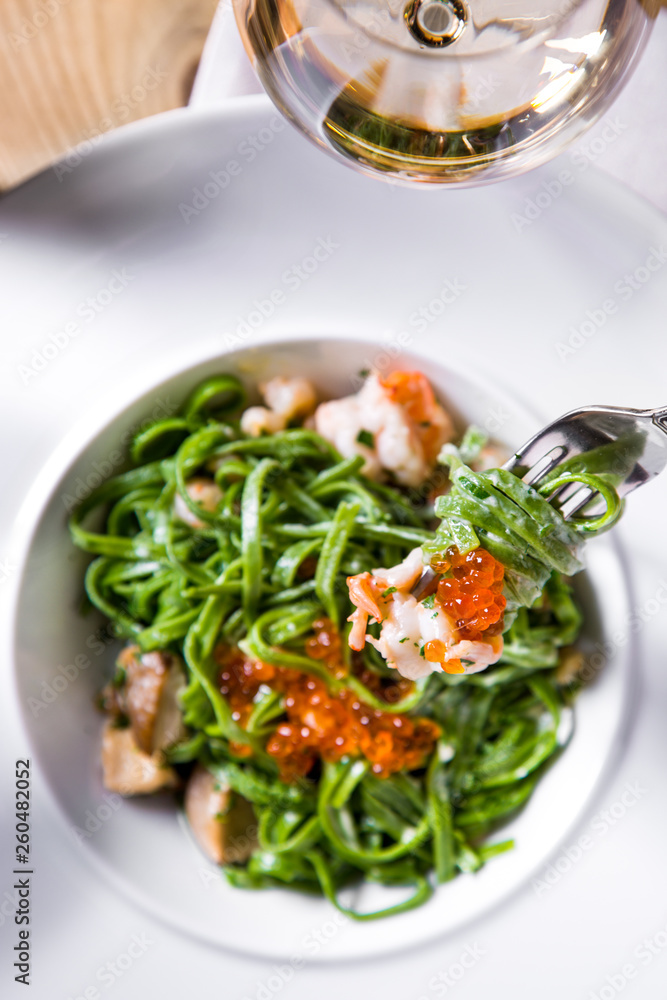 Pasta with shrimp and salmon caviar. Pasta with shrimp and salmon caviar.