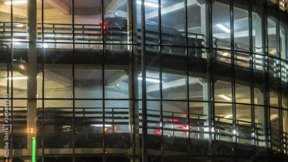 Departure of cars from the multi-storey Parking of the stadium after a football game Departure of cars from the multi-storey Parking of the stadium after a football game