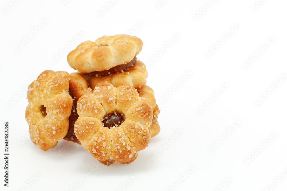 biscuits, filled with pineapple jam isolated on white background.selective focus. biscuits, filled with pineapple jam isolated on white background.selective focus.