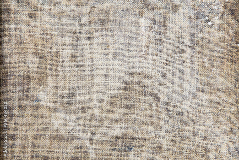 Very old fabric is spoiled by time. top view. close-up Very old fabric is spoiled by time. top view. close-up