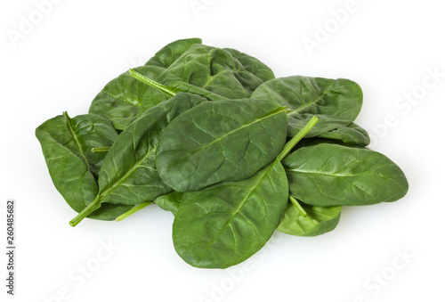 Heap of spinach leafs isolated on white background