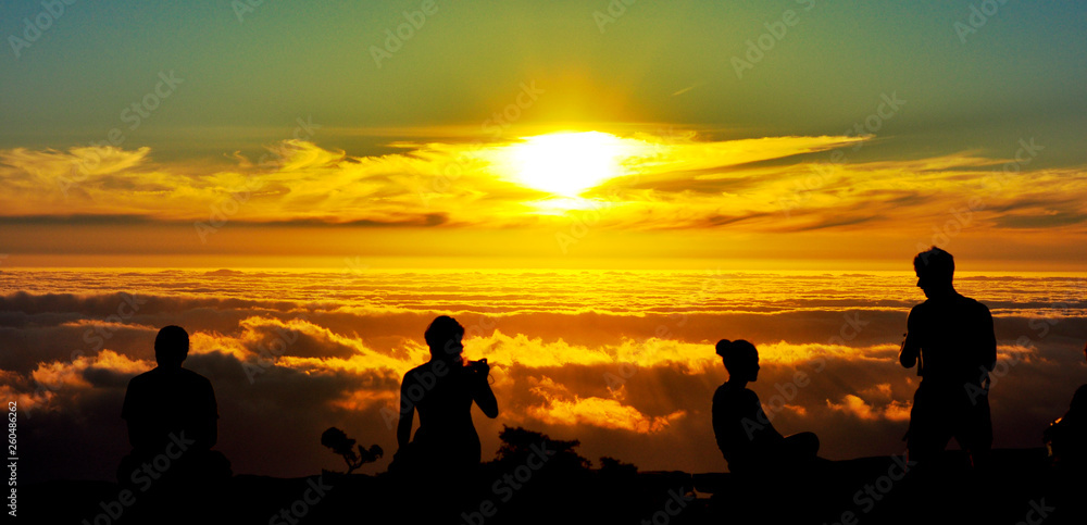 Magical sunset and silhouettes of people at Table Mountain, South Africa