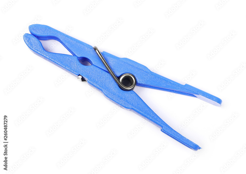 Purple plastic clothespin isolated on white background, top view Purple plastic clothespin isolated on white background, top view