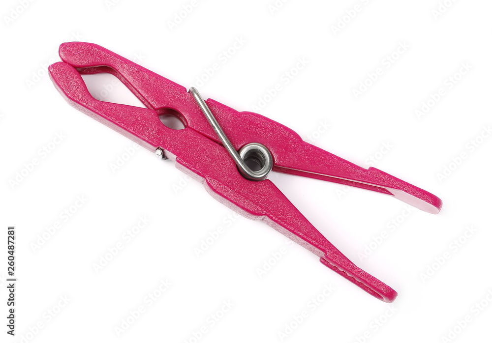 Purple plastic clothespin isolated on white background, top view Purple plastic clothespin isolated on white background, top view