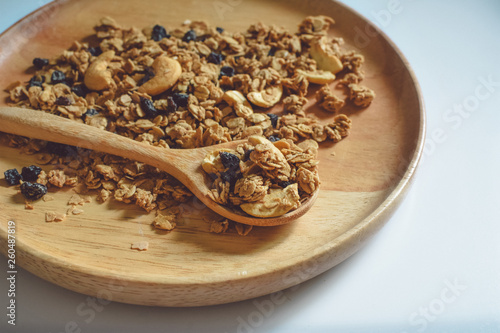 sereal on wooden plate spot focus and close-up view,healthy natural food photo