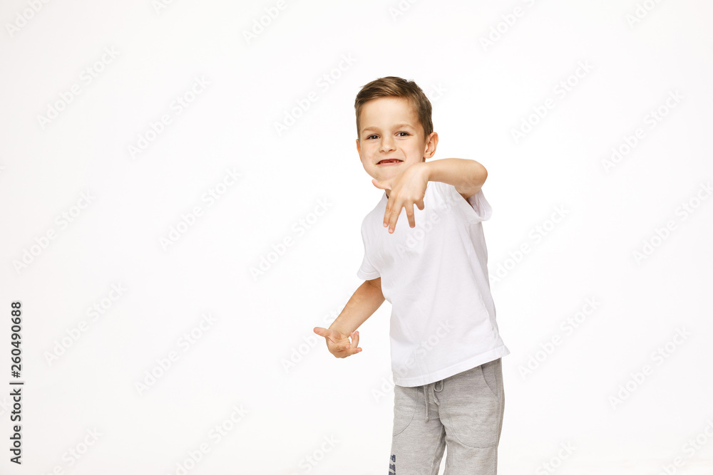 beautiful boy is dancing on a white background 