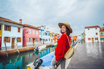 Smiling tourist traveling in Italy