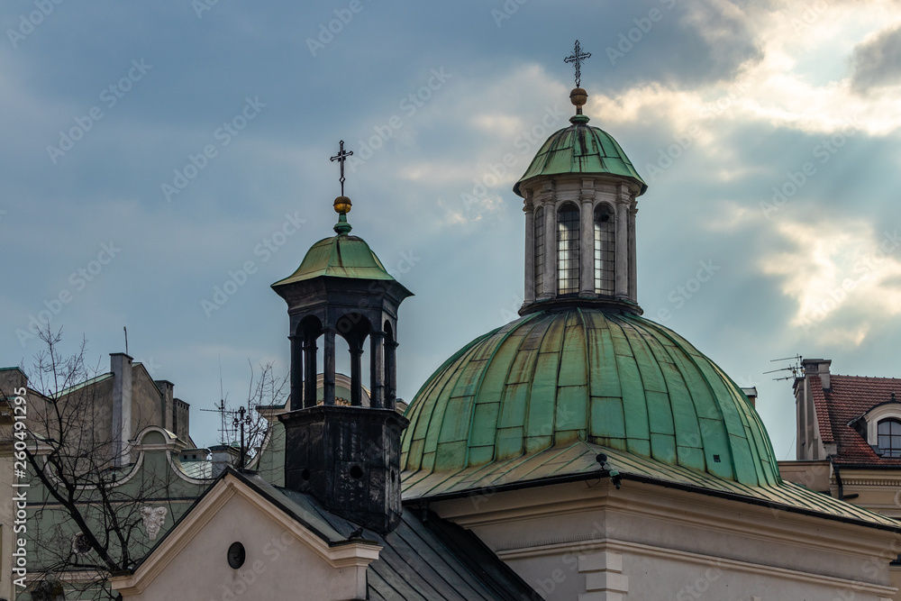 Towers on the roof of the church of St. Wojciech on the Main Square in Krakow, Poland