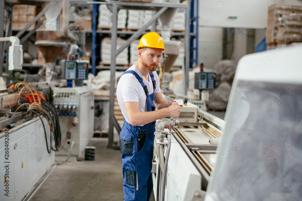 Factory worker. Man with helmet working with pvc. Factory worker. Man with helmet working with pvc.