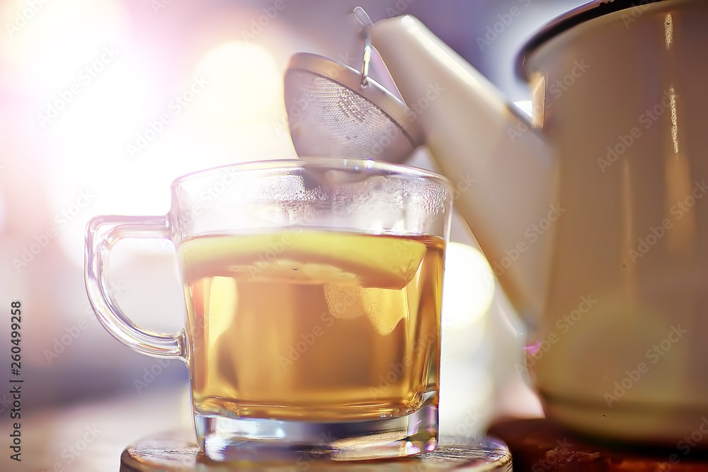 English tea in a cafe / cup and kettle with five o'clock tea English tea in a cafe / cup and kettle with five o'clock tea