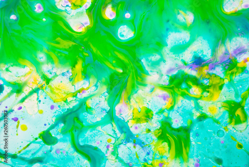 Aquarelle abstract background. Fluid art green psychedelic pattern.