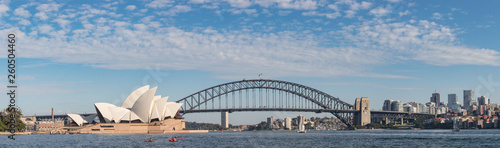 Kayakers paddling in Sydney harbour, with the famous Harbour Bridge and Opera House in the background © Michael Evans