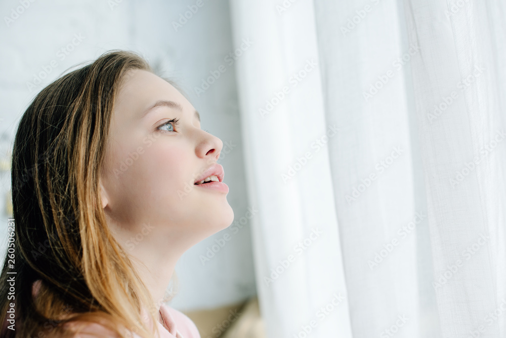 Inspired cute teenage child looking away with open mouth Inspired cute teenage child looking away with open mouth