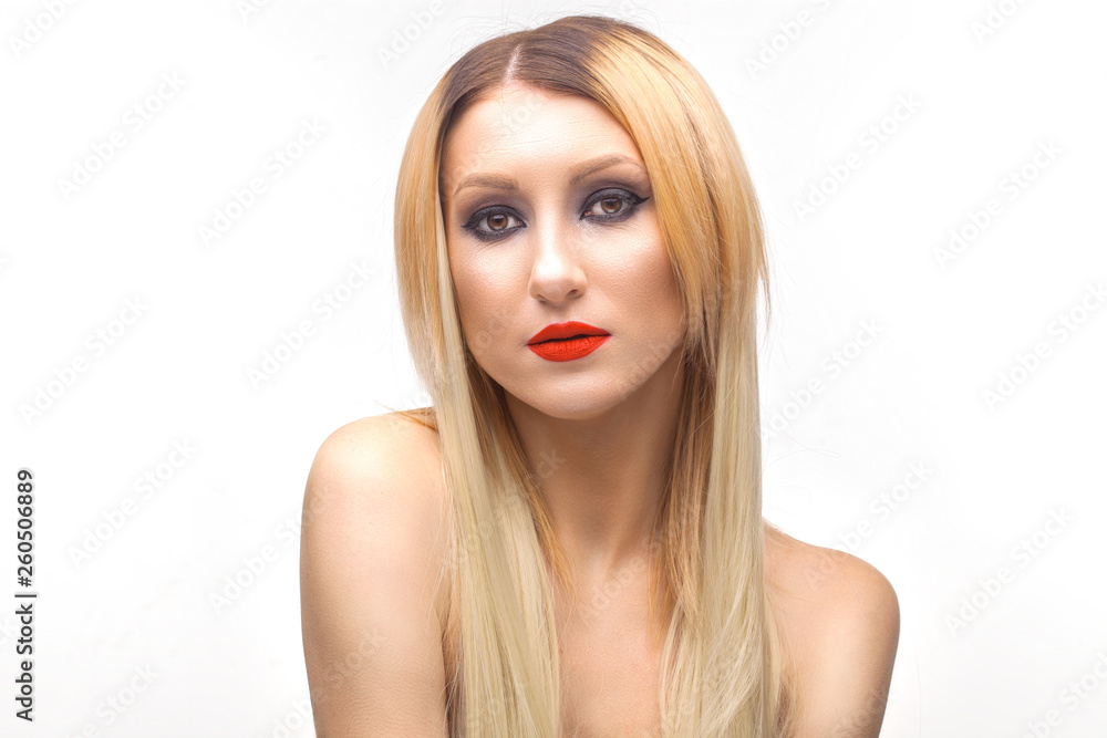 Beautiful blonde woman face studio on white.evening makeup, red lipstick. high key portrait Beautiful blonde woman face studio on white.evening makeup, red lipstick. high key portrait