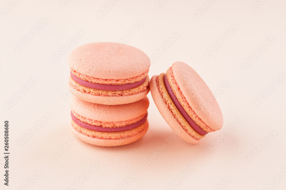 Stack of pink macarons on same color background. Stack of pink macarons on same color background.