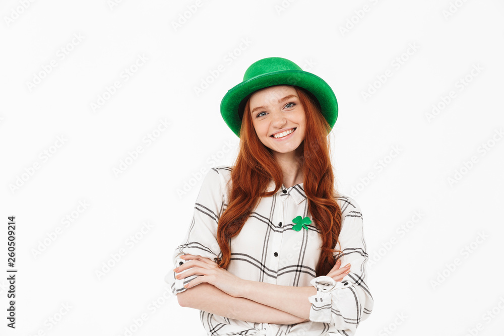 Happy young redheaded girl wearing green hat Happy young redheaded girl wearing green hat