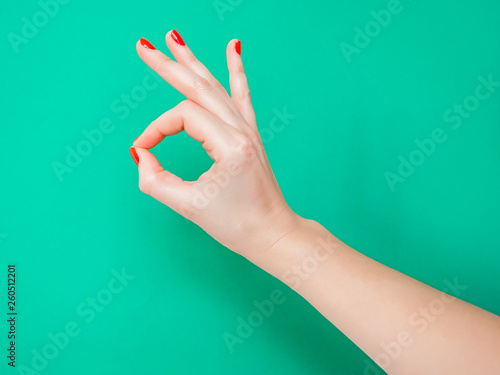 The A-Ok Hand Sign is signify that everything s going just fine. This is the perfect hand gesture to communicate all is well. photo