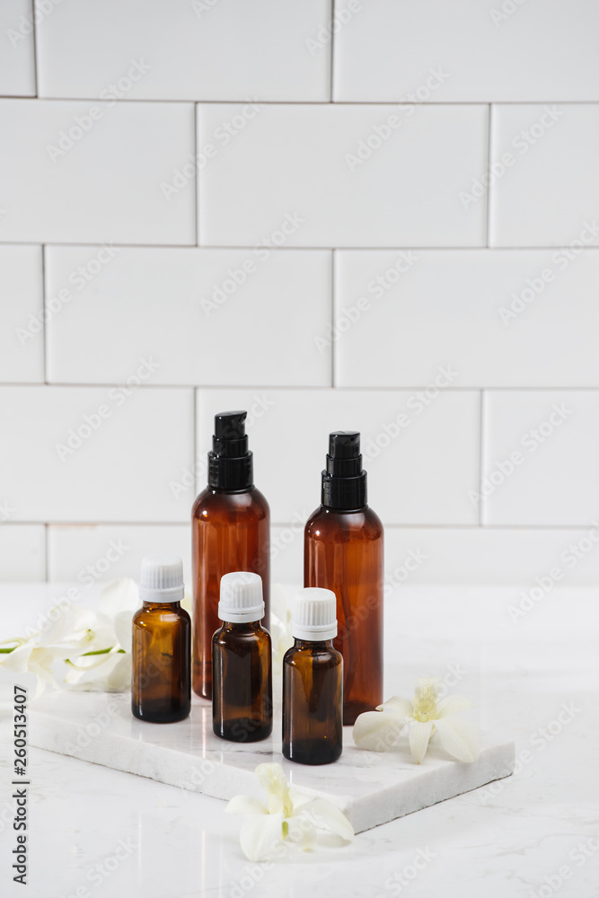 Different cosmetic bottles isolated on white Different cosmetic bottles isolated on white
