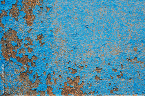 Old Painted Blue Wall. Background. Cracked Flaked Shabby Wall With Rundown Stucco Layer Texture.