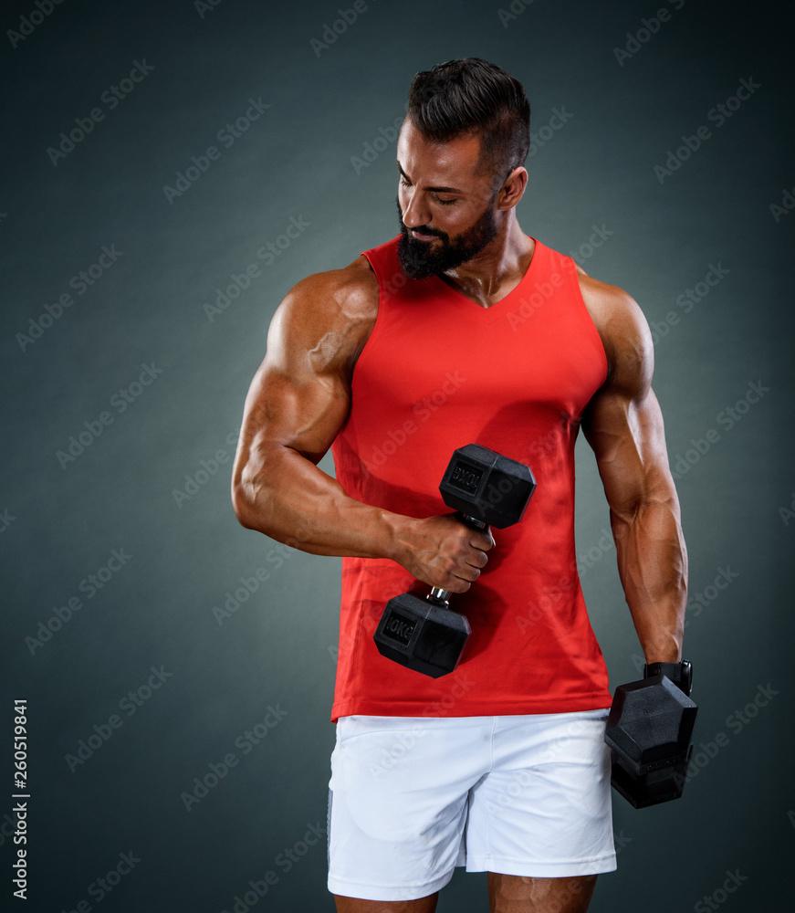 Handsome Muscular Men exercise With Dumbbells