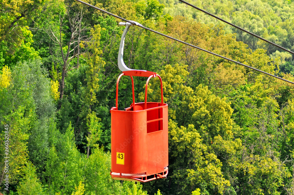 Red cable car in summer