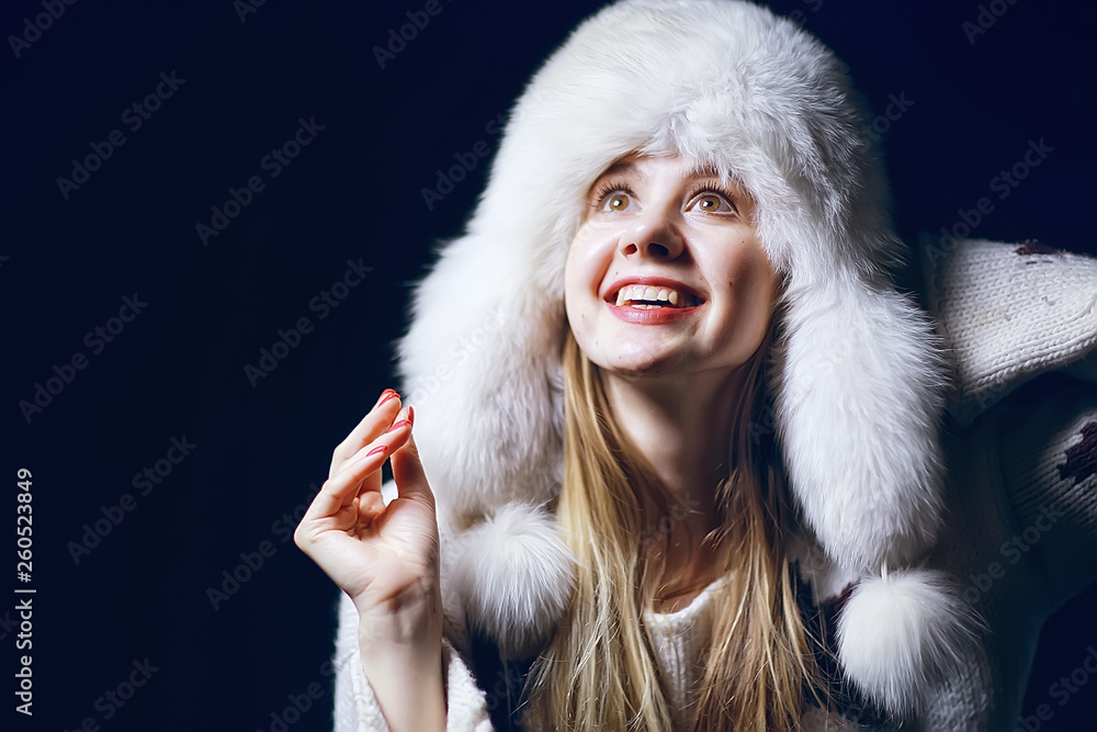 model in winter hat / beautiful adult girl in a big fur hat, winter clothes, Christmas holiday model in winter hat / beautiful adult girl in a big fur hat, winter clothes, Christmas holiday