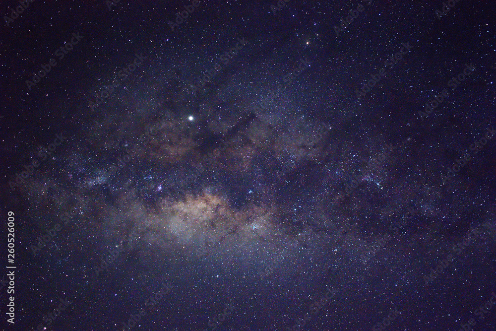 Fototapeta premium Clearly milky way galaxy rising in Borneo Asia, background of beautiful milky way. Long exposure photograph with grain. Image contain certain grain or noise and soft focus.