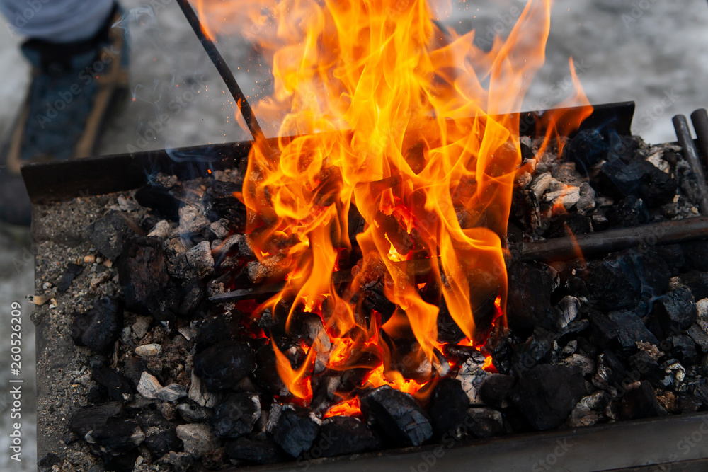 Heating of metal billets on the fire. Heating of metal billets on the fire.