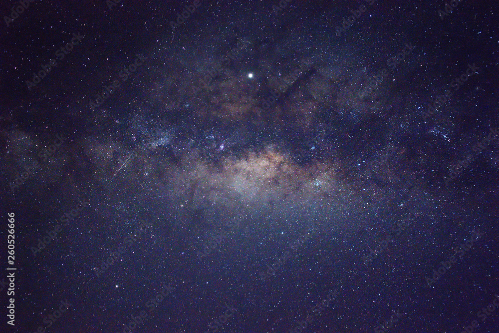 Clearly milky way galaxy rising in Borneo Asia, background of beautiful milky way. Long exposure photograph with grain. Image contain certain grain or noise and soft focus.