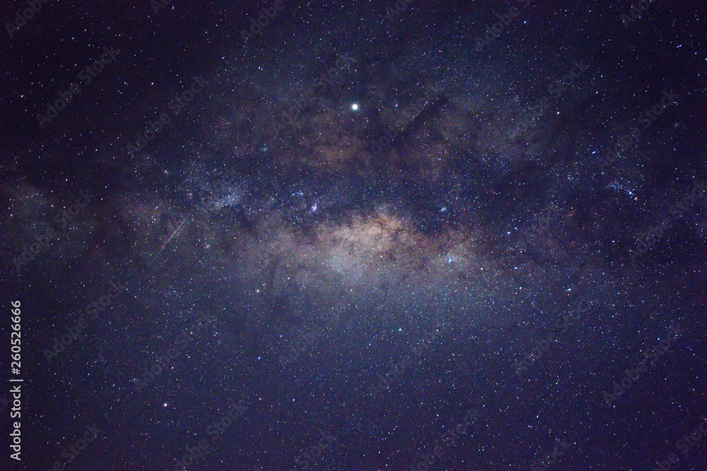 Obraz premium Clearly milky way galaxy rising in Borneo Asia, background of beautiful milky way. Long exposure photograph with grain. Image contain certain grain or noise and soft focus.