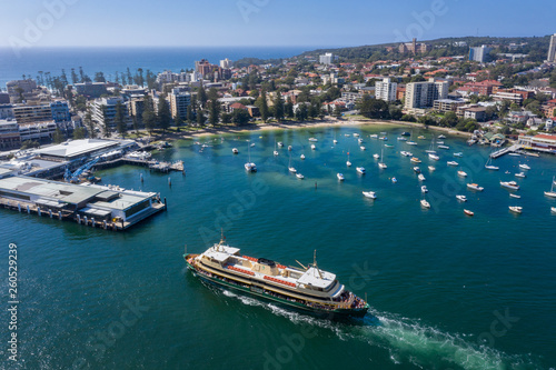 Aerial view of the Circular Quay ferry approaching Manly Wharf and harbour in Sydney, Australia