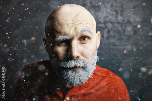 hipster santa claus winter portrait of a man with a beard / gray beard and mustache, christmas portrait guy