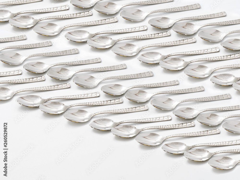 cutlery forks and spoons on a white background cutlery forks and spoons on a white background