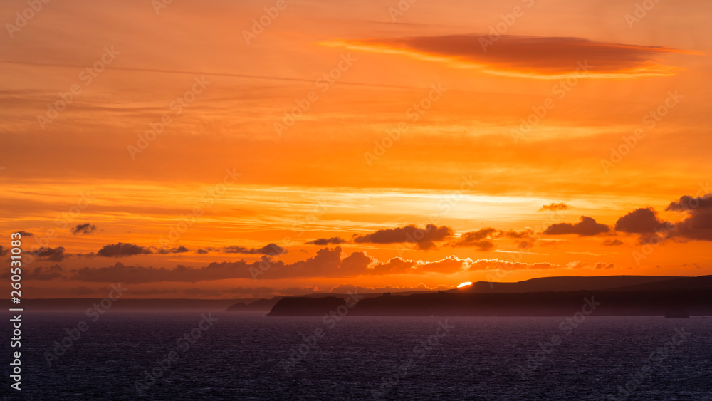 Sunrise at summer solstice at Pentire Point in North Cornwall, England UK