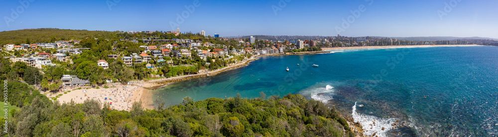 Panoramic view of Shelley Beach and Manly beach on a busy summer afternoon in Sydney Australia