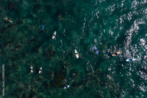 Sydney Australia April 6th 2019 : Overhead view of surfers at Shelly beach in Manly, Sydney, Australia © Michael Evans