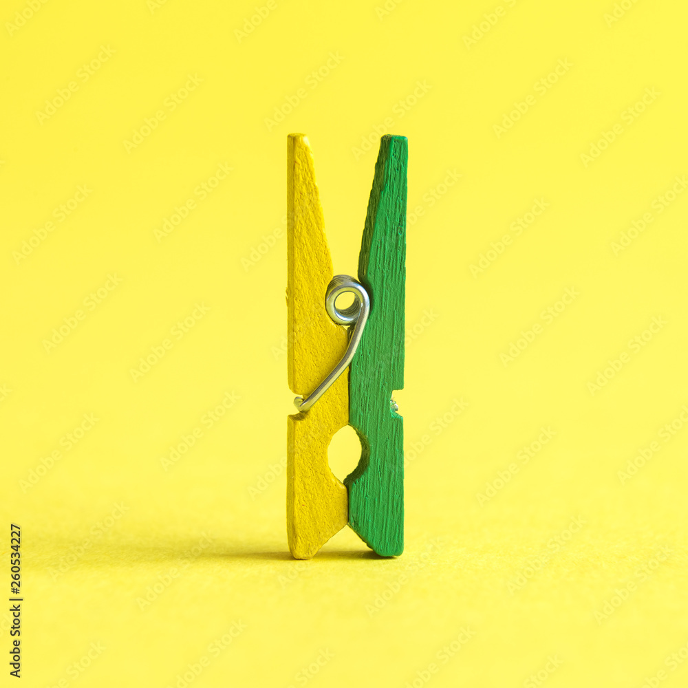 Yellow and green wooden clothespin macro abstract. Yellow and green wooden clothespin macro abstract.