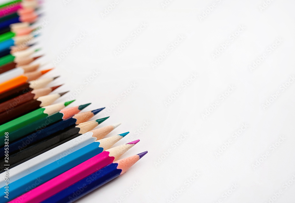 Colored pencils on a white background, with space for your text, blank for banner Colored pencils on a white background, with space for your text, blank for banner