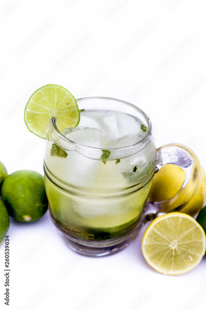 Popular Summer Drink isolated on white i.e. Virgin mint mojito with fresh lemons also. Popular Summer Drink isolated on white i.e. Virgin mint mojito with fresh lemons also.