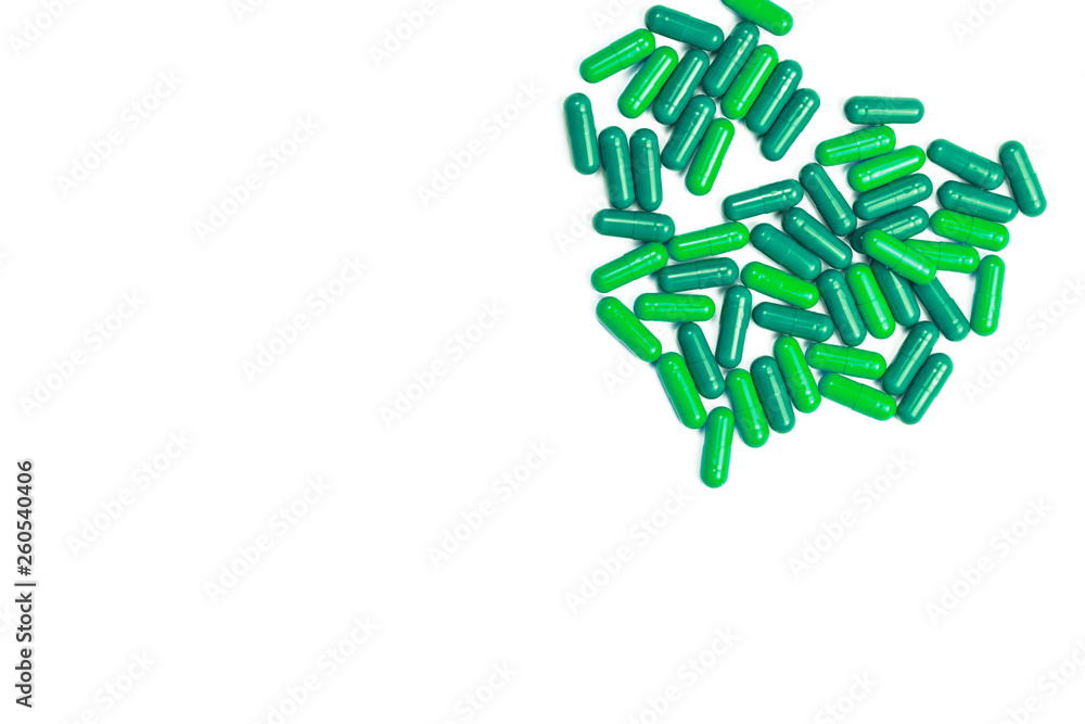 Green pills on white isolated background Green pills on white isolated background
