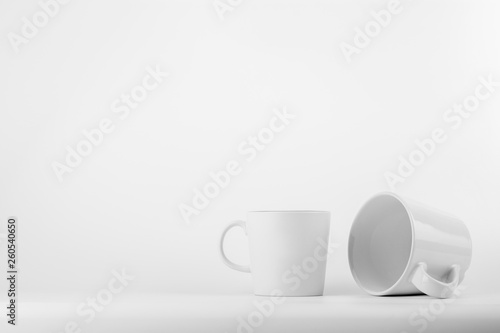 white ceramic coffee cup on white background.