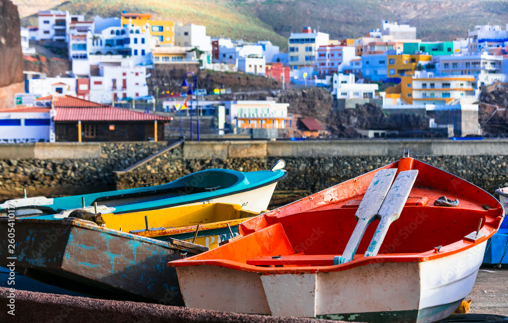 old colorful fishing boats in Puertito de Sardina fishing village, Grand Canary island