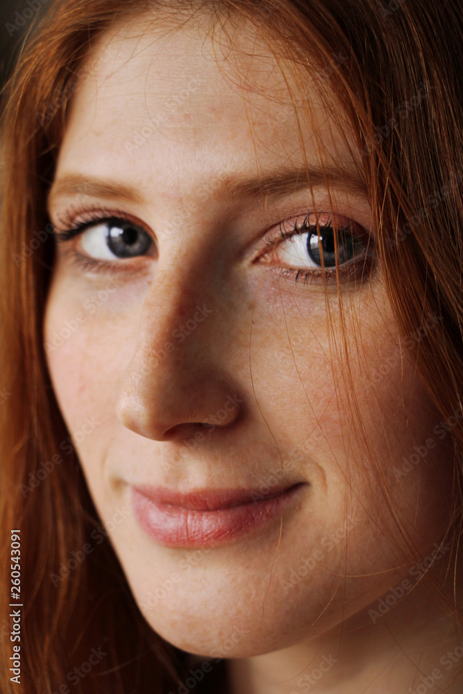 portrait of red-haired girl with freckles portrait of red-haired girl with freckles
