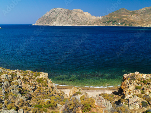 Wallpaper Mural Beautiful greek summer sunny beach bay. View to aegean blue sea with awesome turquoise water. Island paradise. Psili Ammos Beach, Patmos Island, Dodecanese, Greece Torontodigital.ca