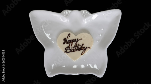 Heart-shaped greetings and birthdays on a black background photo