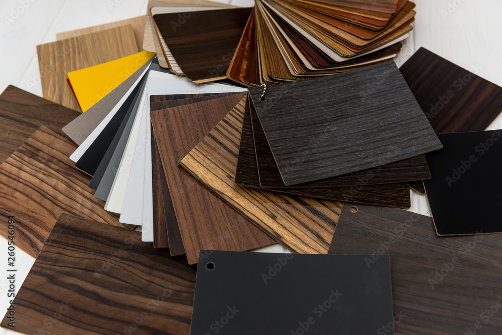 Colorful and different wooden samples on table - obrazy, fototapety, plakaty 