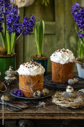 Easter table with Traditional Orthodox Easter bread Kulich  spring giacinth  vintage decoration.